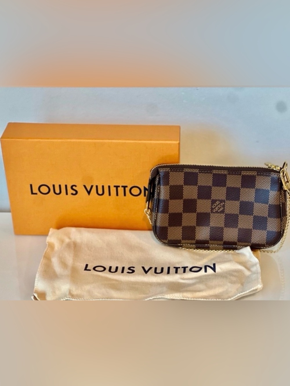 Louis Vuitton Mini Pochette Accessoires – Damier Ebene | New, Authentic